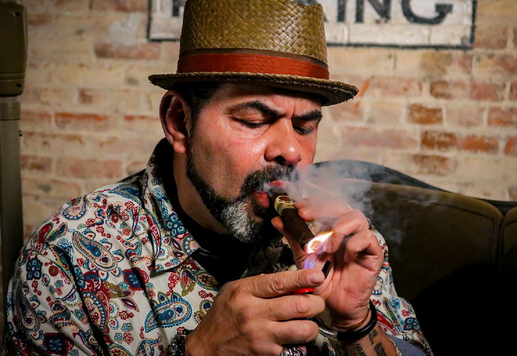 Man Smoking Cuban Cigar